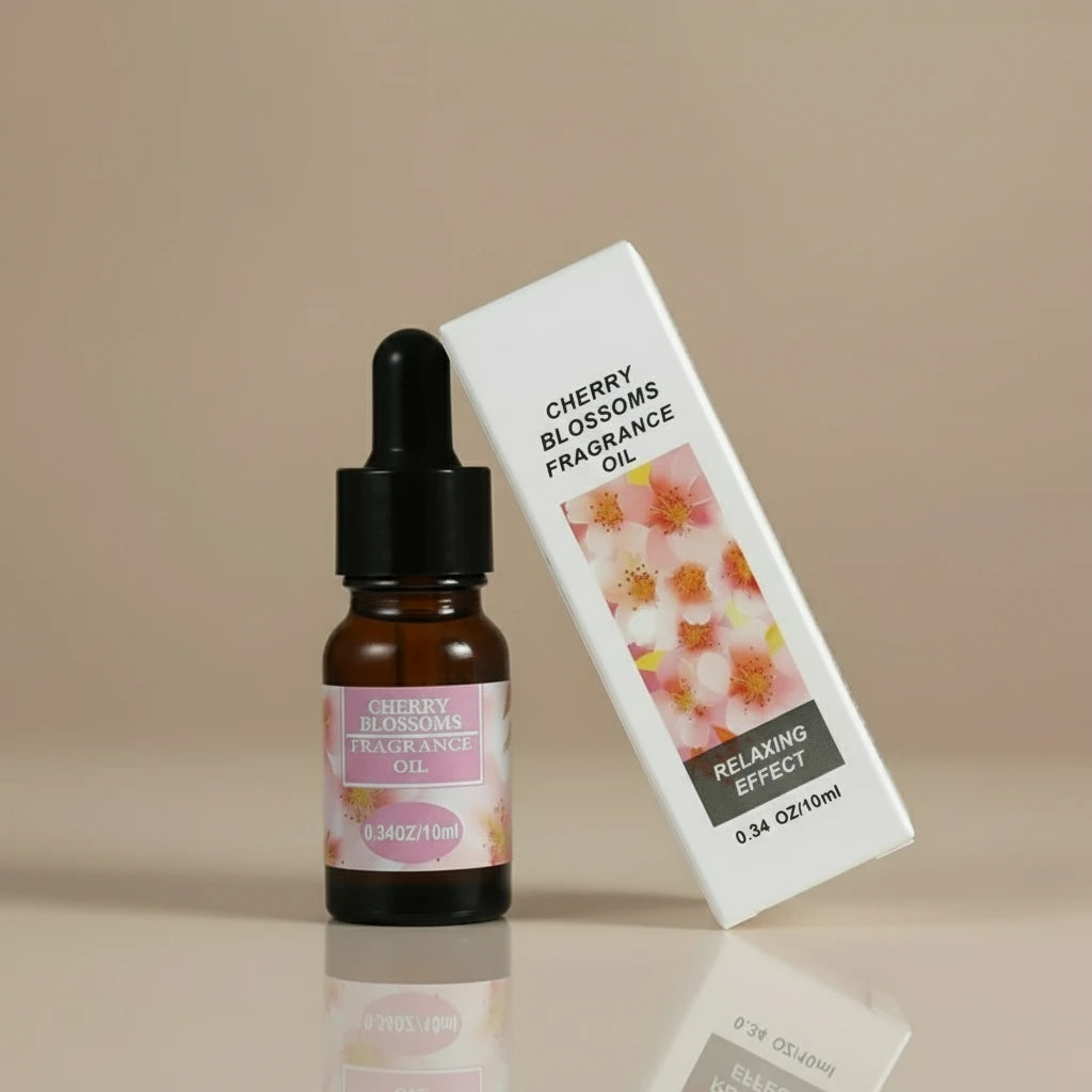 Cherry Blossoms fragrance oil bottle and packaging on a white background